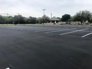 What Are the Pros and Cons of Sealcoating Your Asphalt Pavement? asphalt sealcoating, austin tx