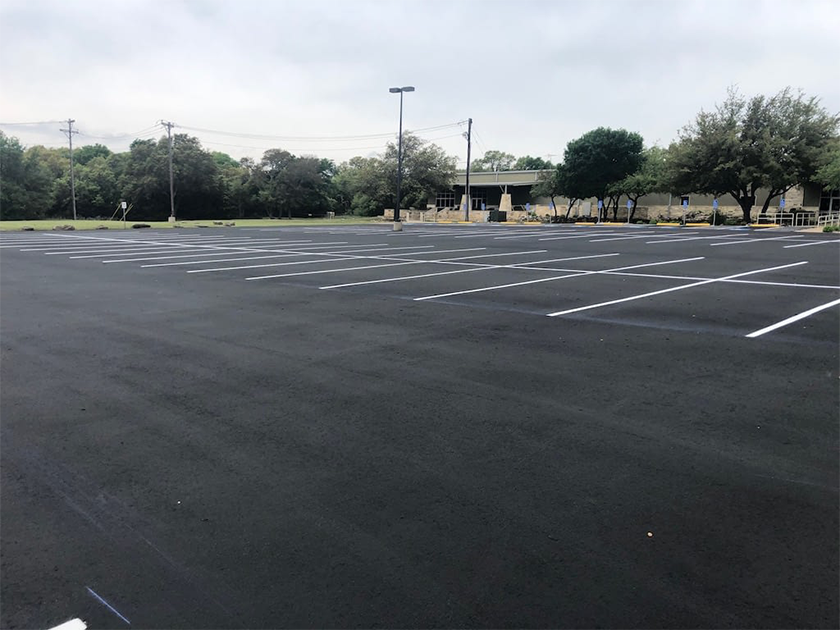 What Are the Pros and Cons of Sealcoating Your Asphalt Pavement? asphalt sealcoating, austin tx
