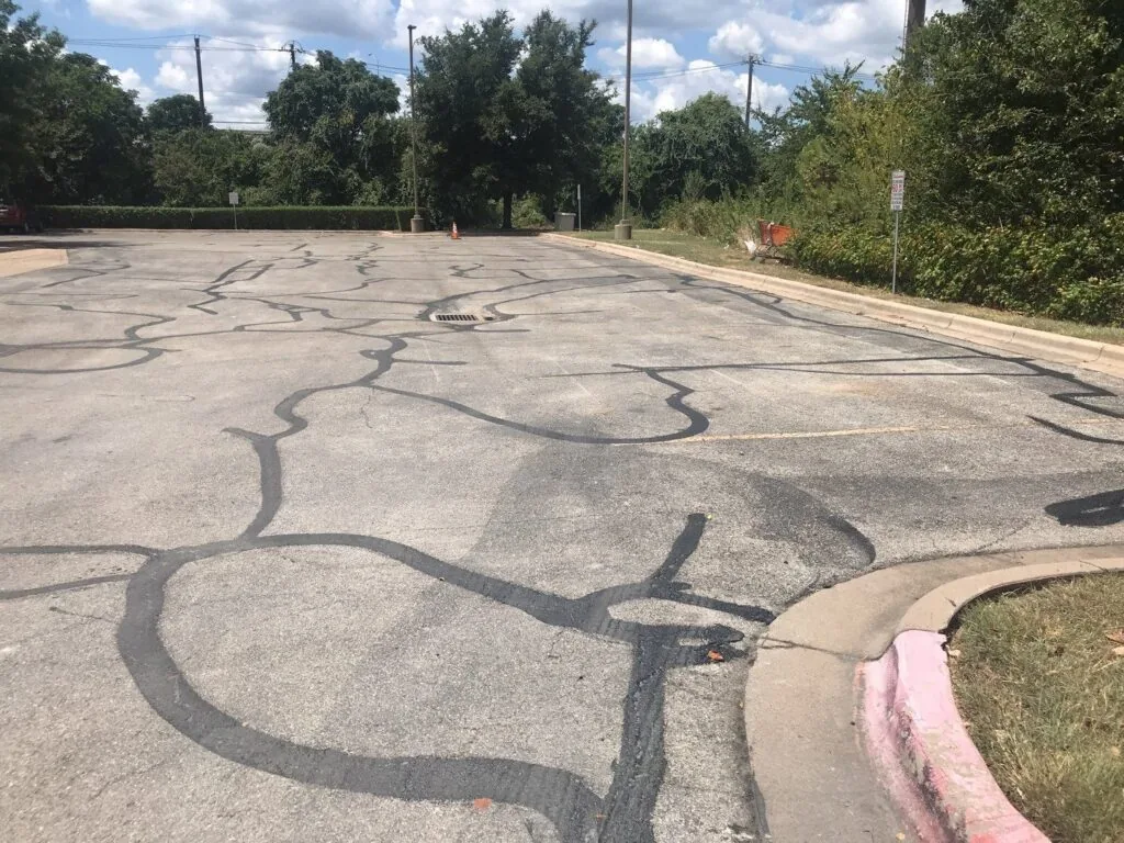 Why HOAs Should Prioritize Asphalt Crack Repairs, HOA crack repair