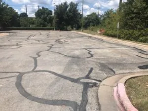 Why HOAs Should Prioritize Asphalt Crack Repairs, HOA crack repair