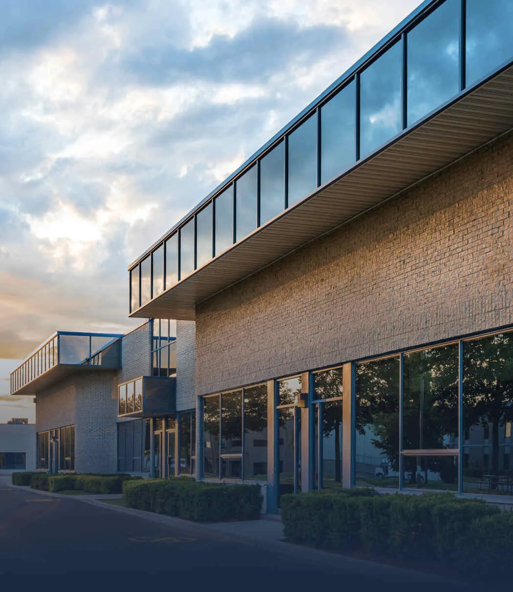 modern retail and restaurant building exterior with parking lot paving and commercial asphalt work completed by Alpha Paving in Texas