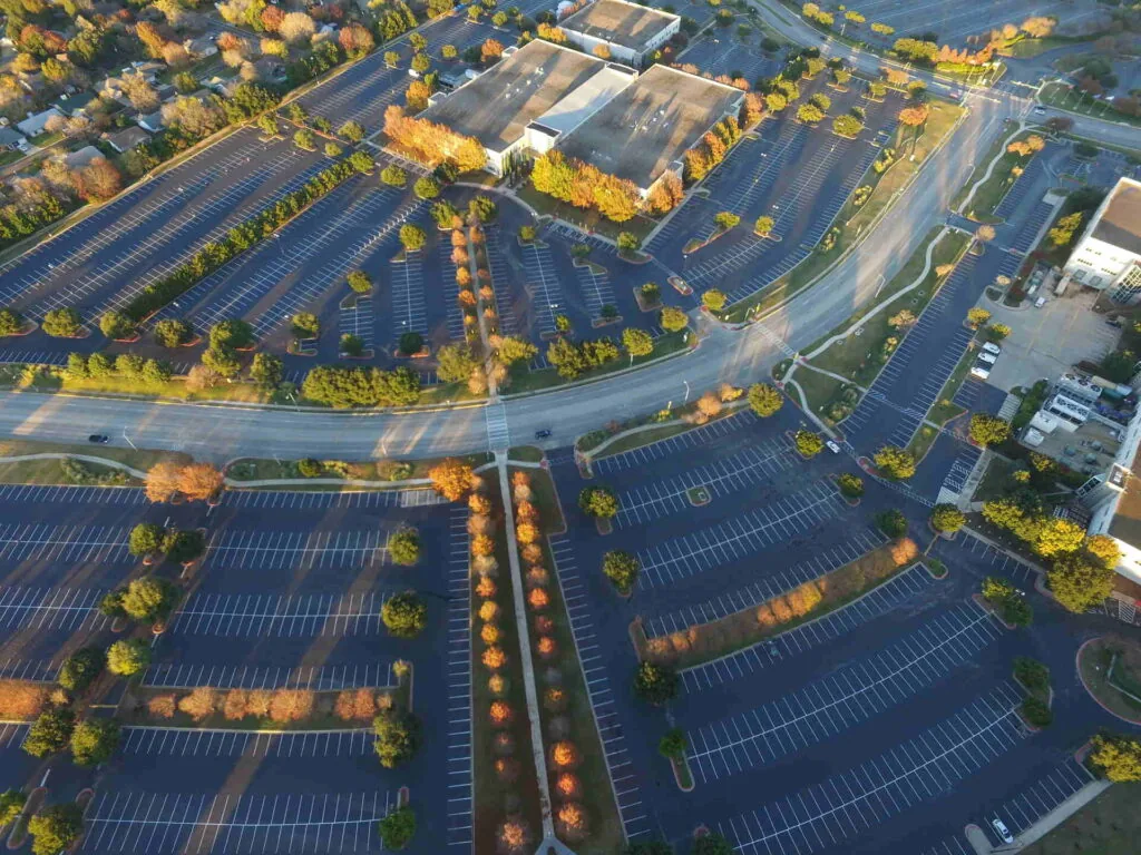 Image of an empty, freshly paved parking lot