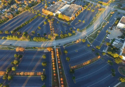 Image of an empty, freshly paved parking lot