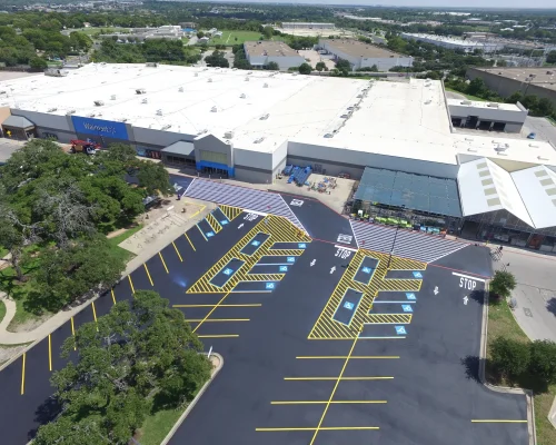 Commercial Property in Texas with fresh asphalt paving and line striping
