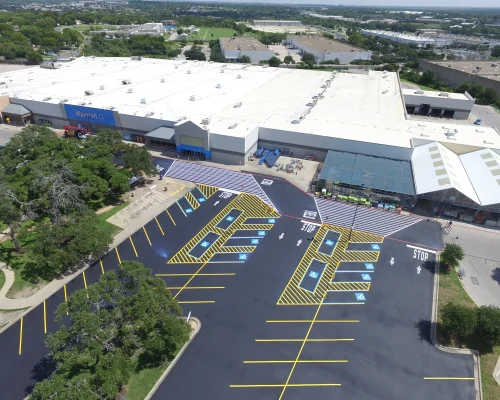 Commercial Property in Texas with fresh asphalt paving and line striping