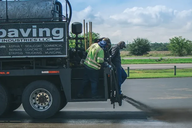 Alpha Paving asphalt sealcoating company at work