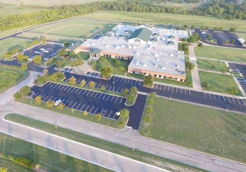 Image of an empty, freshly paved parking lot