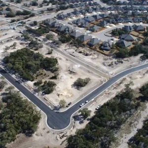 Aerial View of HOA Community in Texas After Asphalt Paving and Sealcoating Services