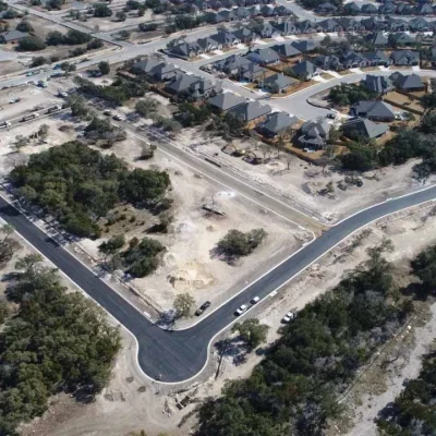 Aerial View of HOA Community in Texas After Asphalt Paving and Sealcoating Services