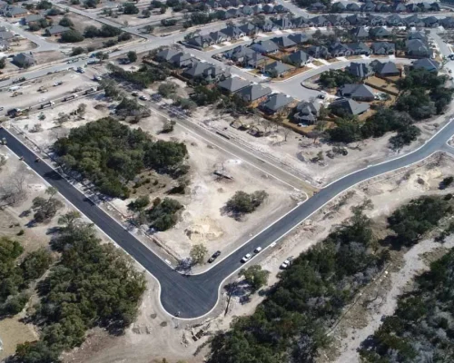 Aerial View of HOA Community in Texas After Asphalt Paving and Sealcoating Services