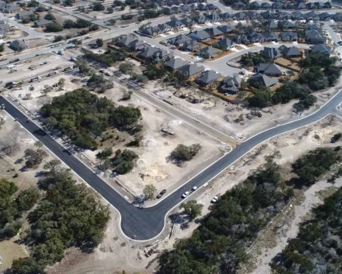 Aerial View of HOA Community in Texas After Asphalt Paving and Sealcoating Services