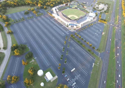 Image of an empty, freshly paved parking lot