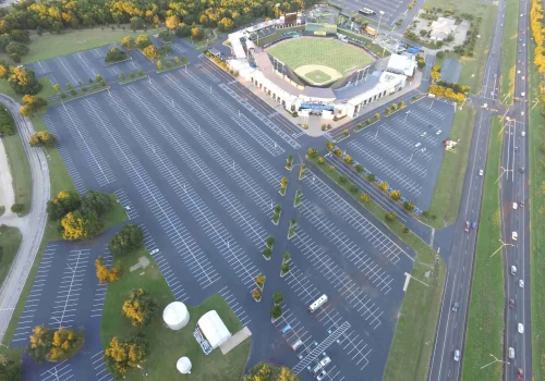 Image of an empty, freshly paved parking lot