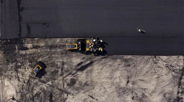 Alpha Paving cost effective pavement maintenance with sealcoating and crack sealing for long lasting asphalt surfaces