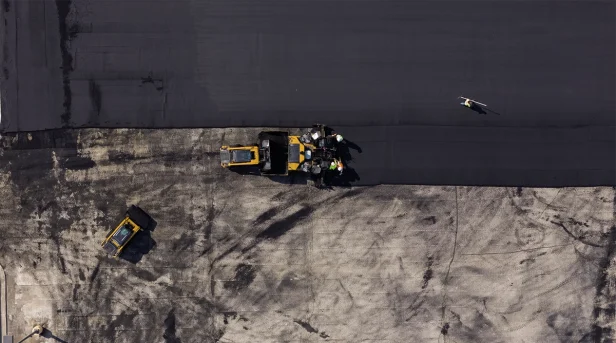 Alpha Paving cost effective pavement maintenance with sealcoating and crack sealing for long lasting asphalt surfaces