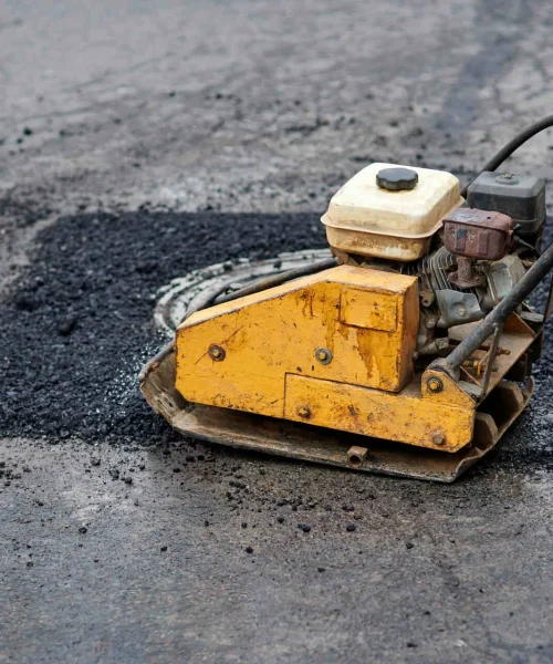 Pothole Repair and Asphalt Patching being performed on pavement in Texas