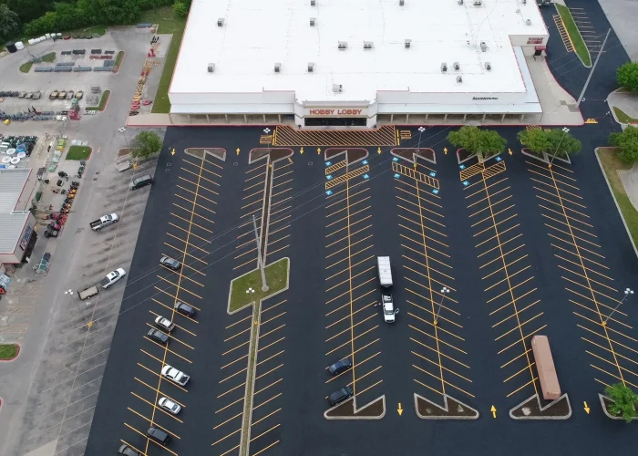 Aerial view of parking lot after sealcoating paving services